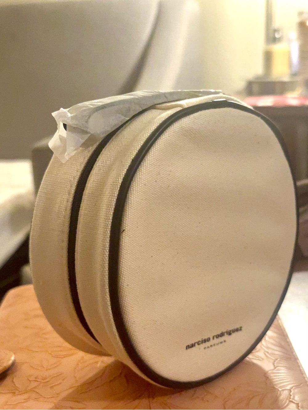 Narciso Rodriguez Cream Round Canvas Travel large wristlet with Black Trim